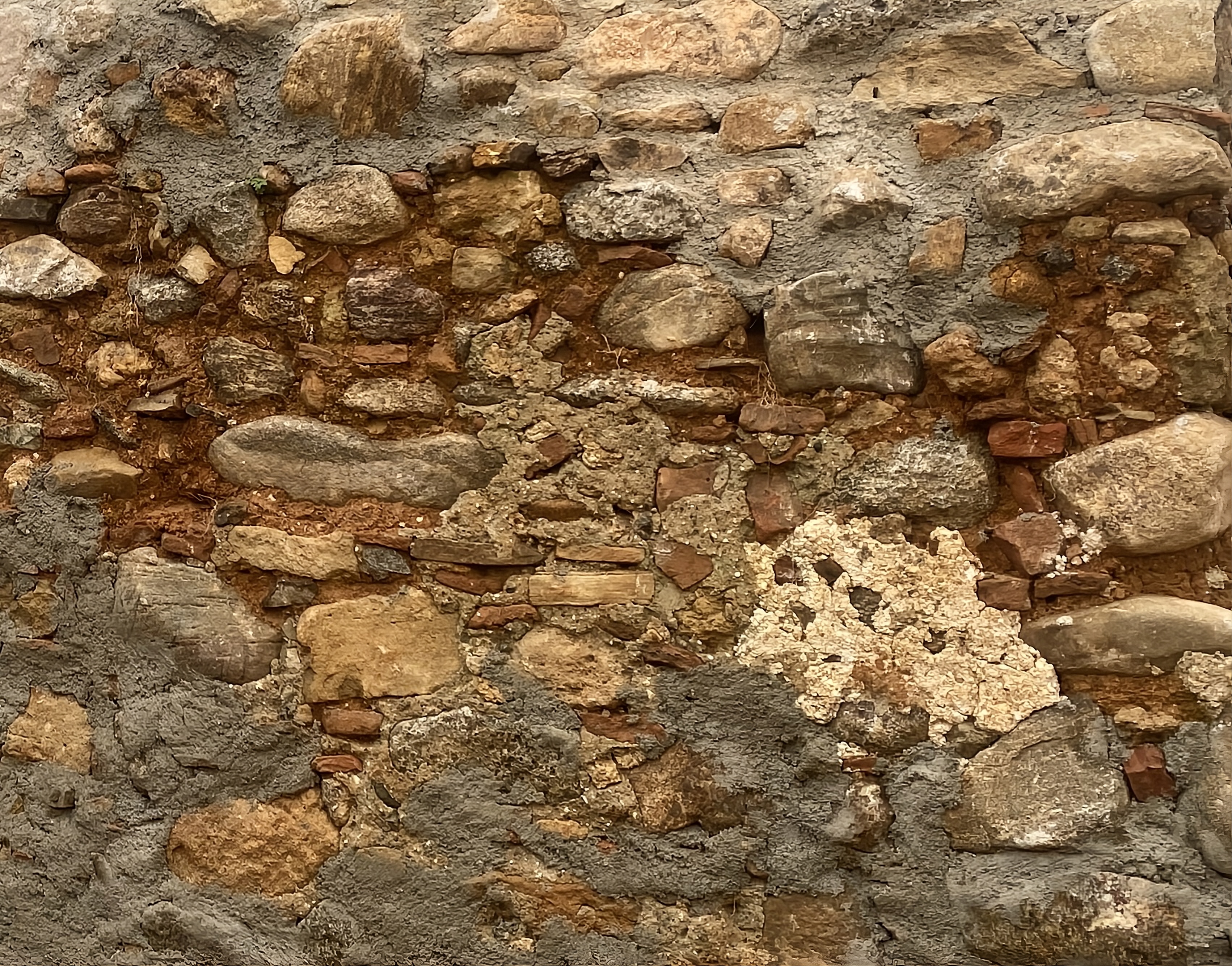 Weathered ancient Calabrian stone wall